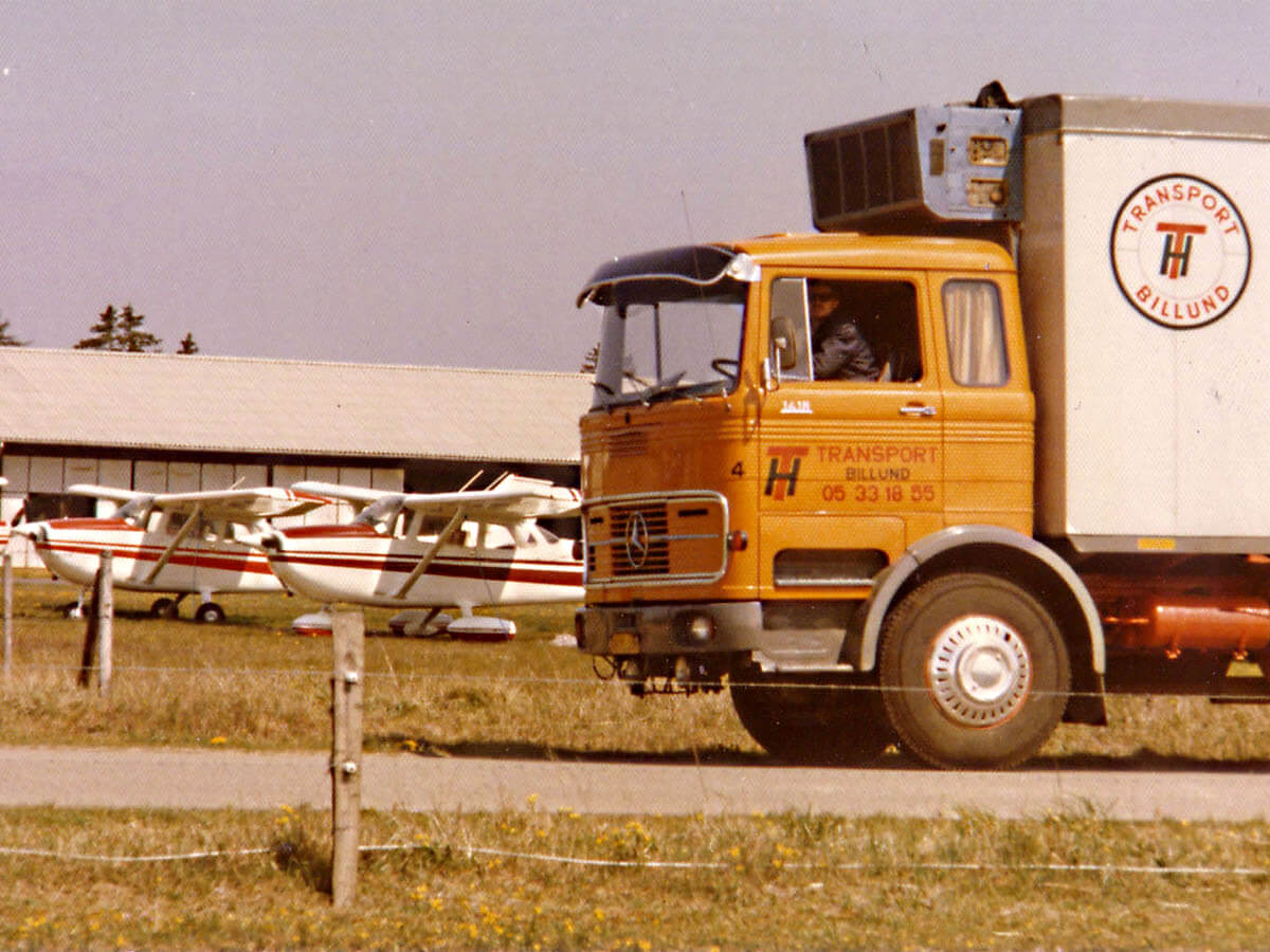 Old Mercedes truck with plane